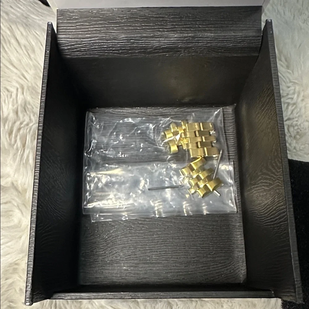 Citizen Gold Timepiece with Black Face